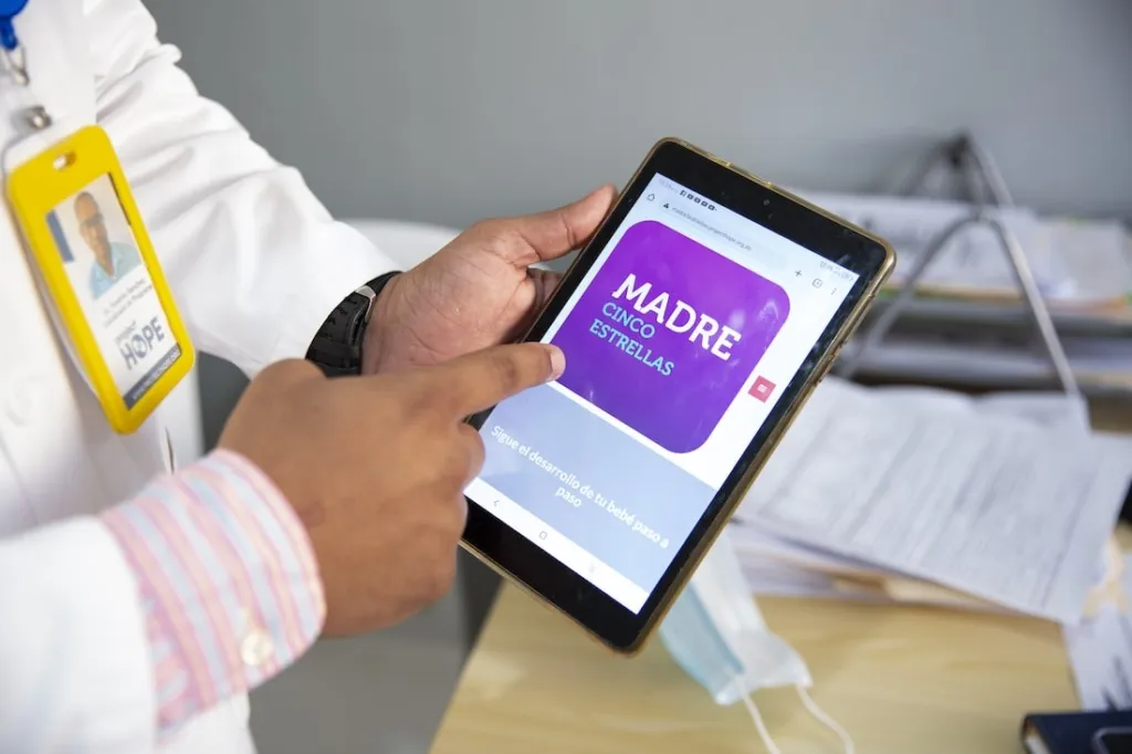 man holding tablet