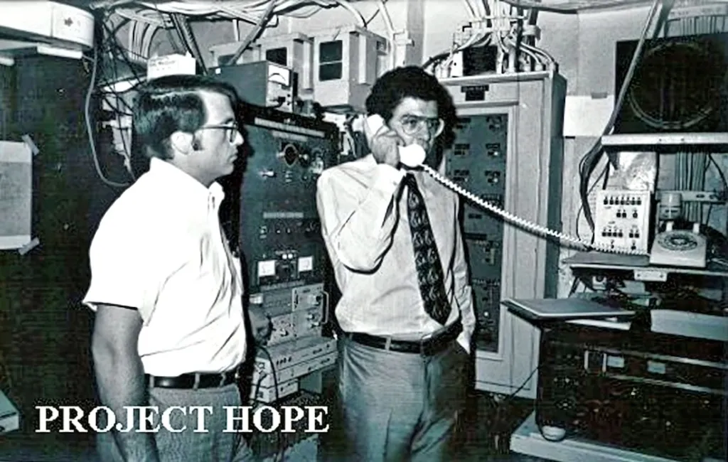 man speaking on telephone